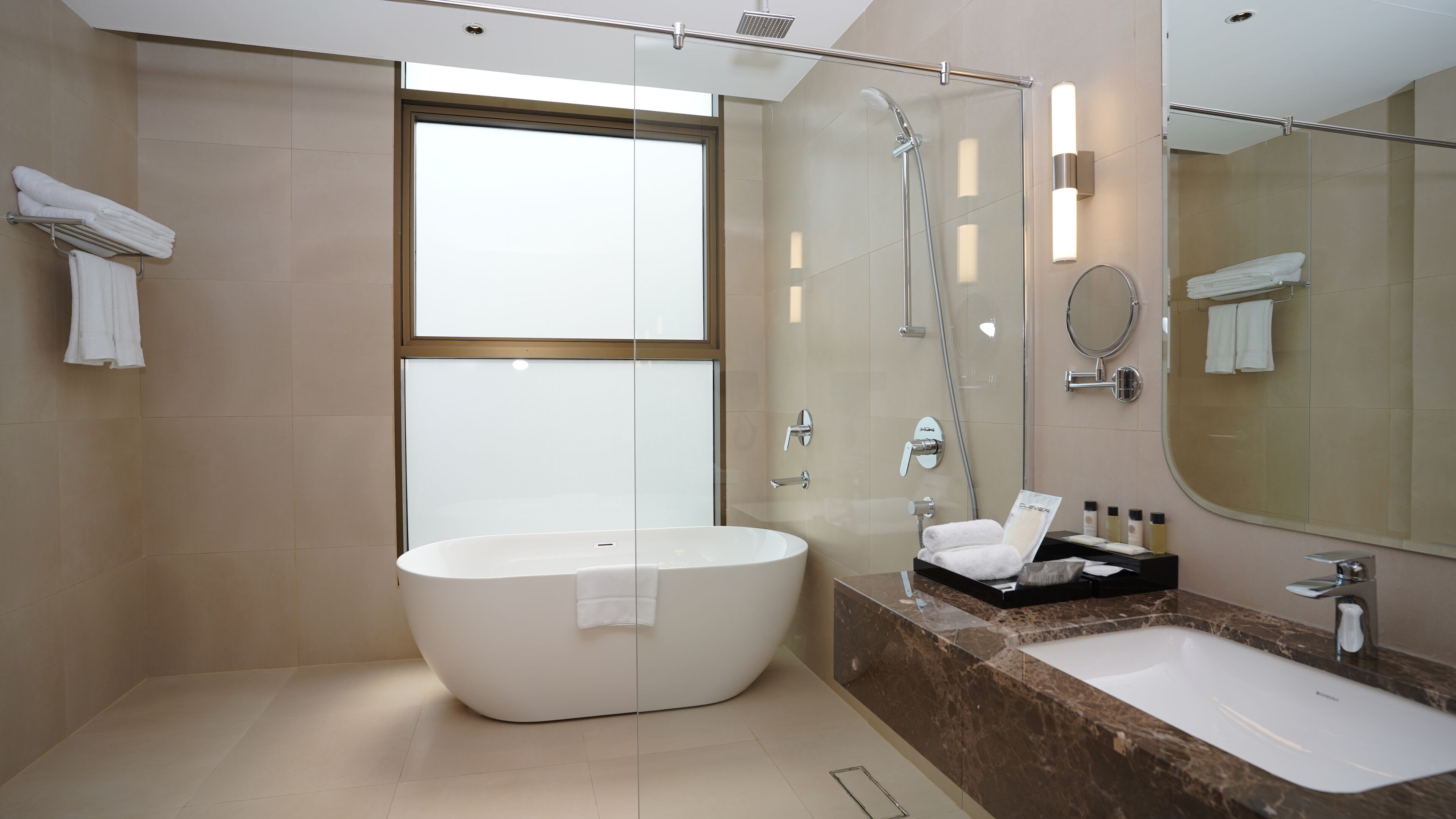 rainfall showerhead, hair dryer, slippers, bidet