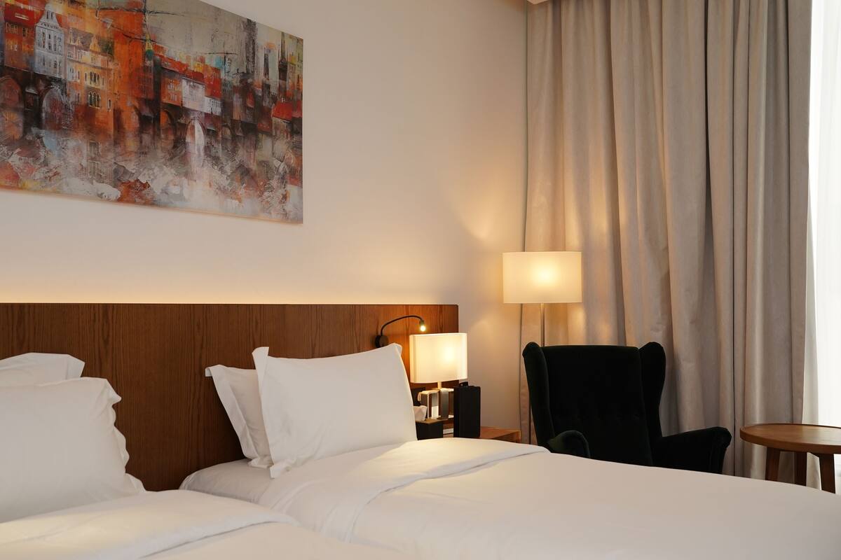 deluxe room, 2 queen beds | premium bedding, pillow-top beds, in-room safe, desk