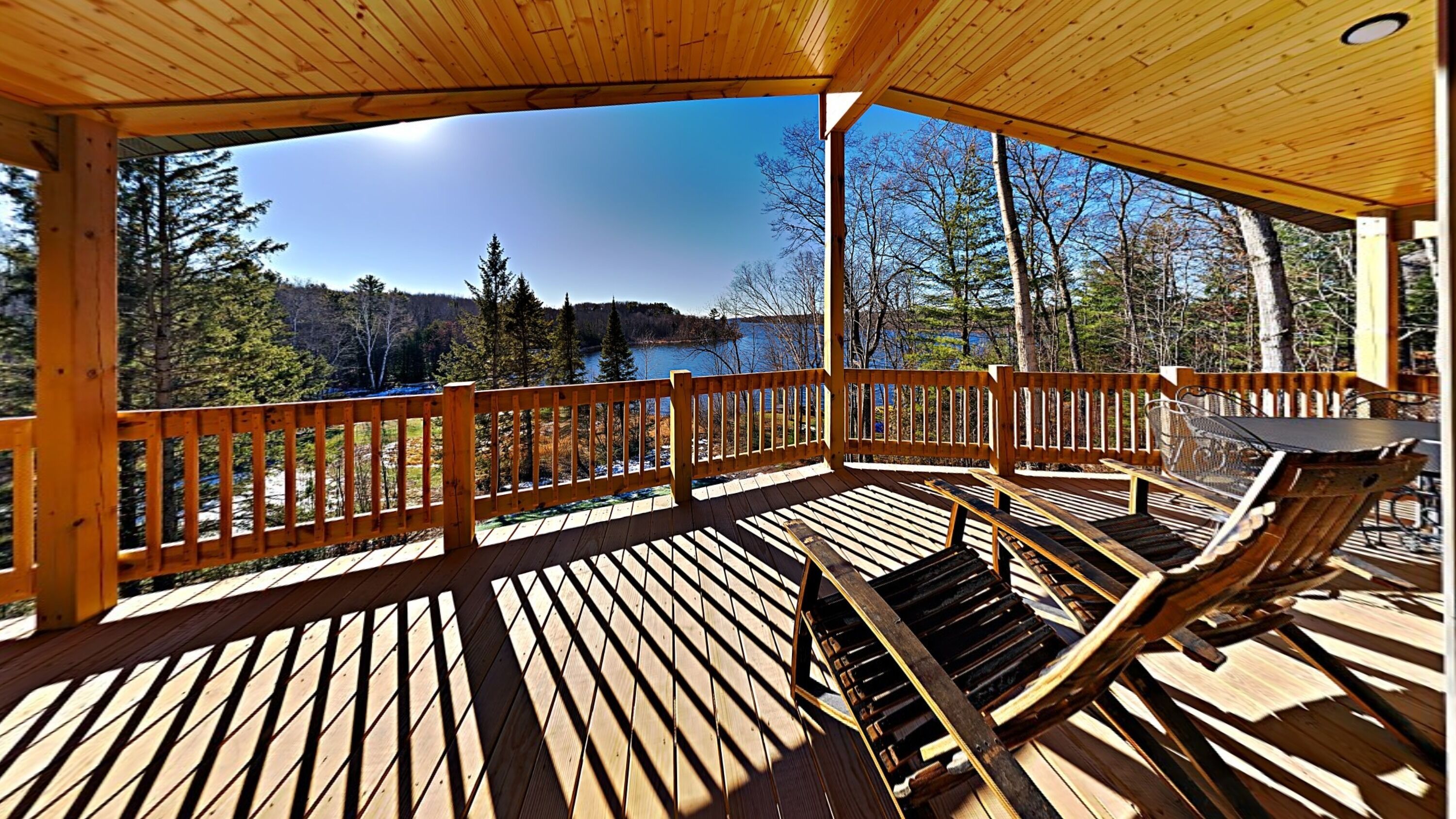 Brand New 5 bedroom Lacourte Orellies lakefront home with covered deck and amazing lake views.
