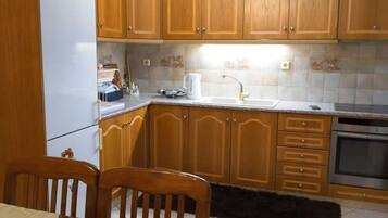 Fridge, oven, electric kettle, toaster