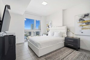 1 bedroom, desk, iron/ironing board, travel crib