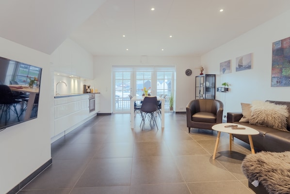 House, 2 Bedrooms, Oceanfront | Living area | 42-inch flat-screen TV with digital channels, TV, heated floors