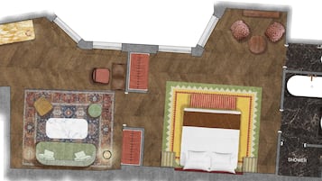 A hotel room layout with a bed, seating area, and a shower.