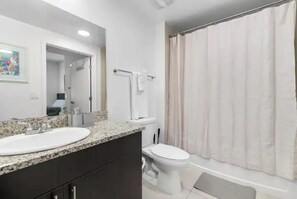 Hair dryer, towels, soap, shampoo