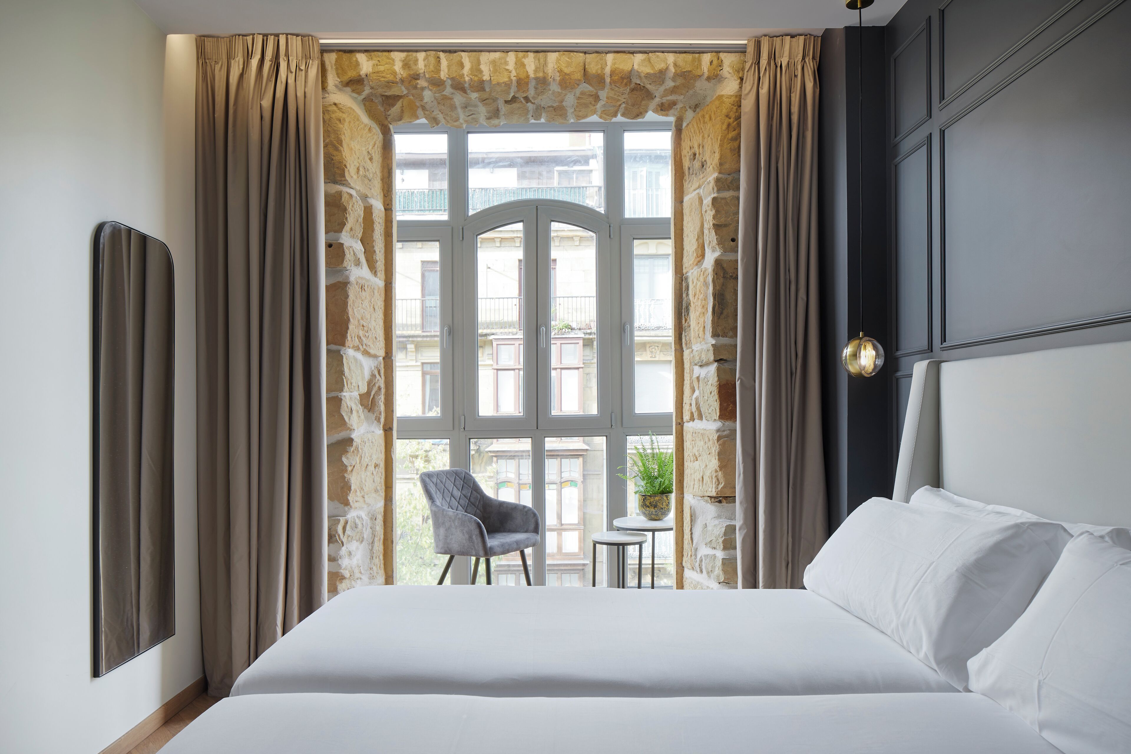 Premium bedding, down comforters, free minibar items, in-room safe
