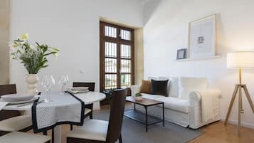 Apartment (GEMINIS) | Living area | 50-inch flat-screen TV with digital channels, TV