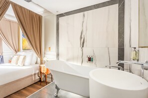 Bathtub, hair dryer, towels