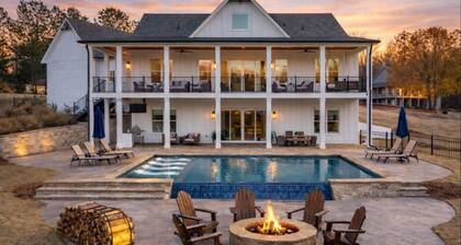 7 Bedrooms • King Suites • Heated Pool • Dock • Kayaks