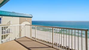 A balcony with a view of the beach and ocean. - Sandy Key 8th floor -Beachfront view -NO HASSLE CHECK OUT (Pensacola)