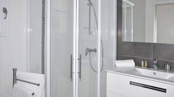 Shower, hair dryer, soap, shampoo