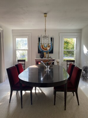 Enjoy meals in this elegant dining room with a round table and comfortable seating for four.