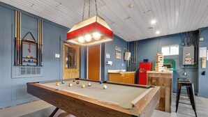 A pool table with balls, a bar area, and a kitchen counter. - Spacious Unit Sleeps 9 + Game Room! 15 Mins from New Bills Stadium (West Seneca)