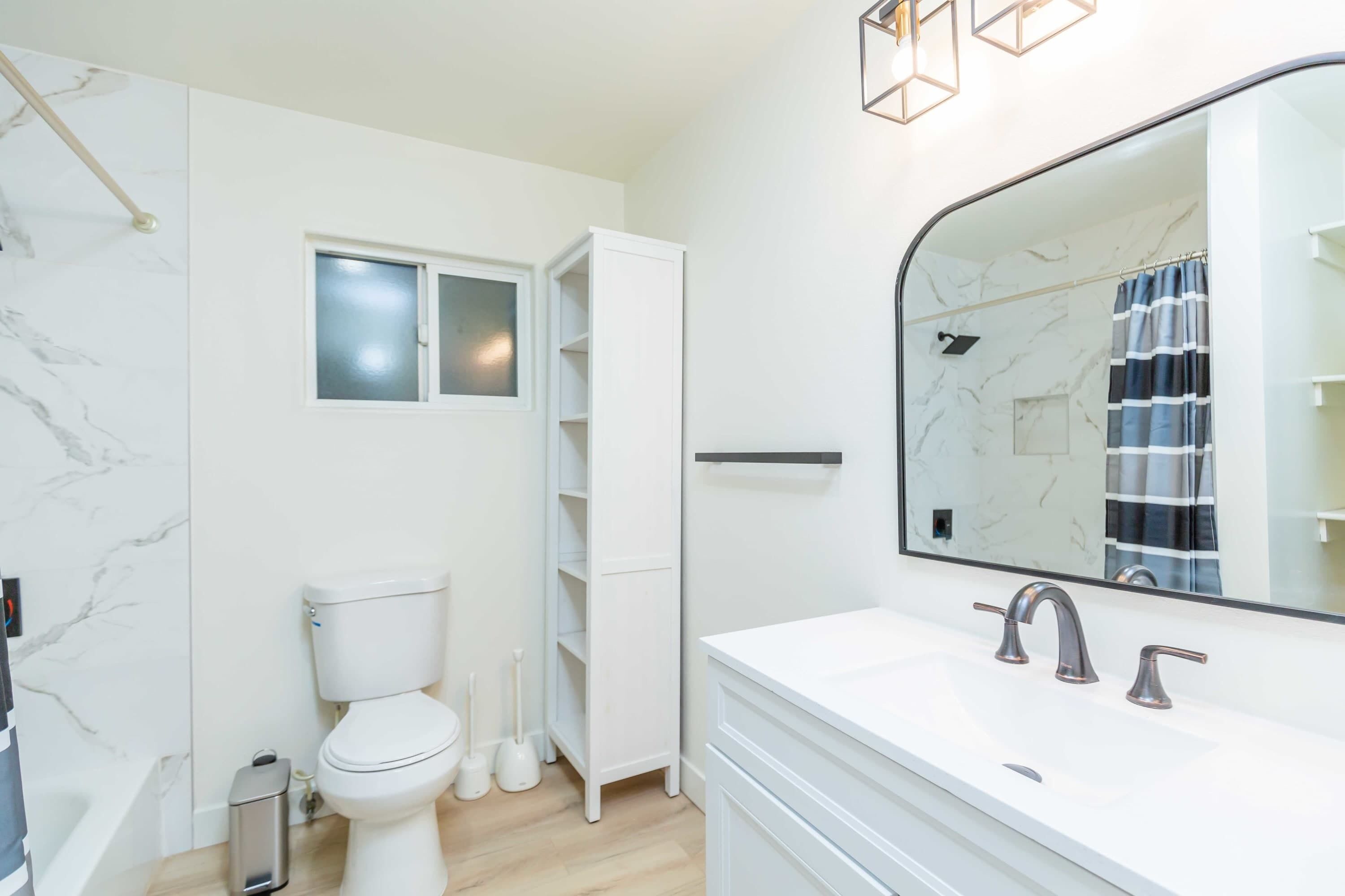 Bathtub, hair dryer, towels