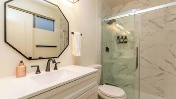Bathtub, hair dryer, towels