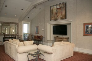 Smart TV, fireplace, books