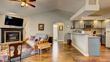 Smart TV, fireplace, books