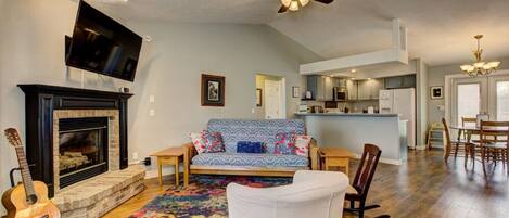 Smart TV, fireplace, books