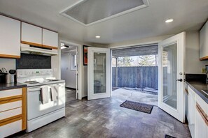 kitchen with double doors to the patio