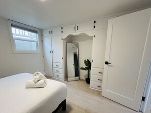 1 bedroom, desk, iron/ironing board, travel cot