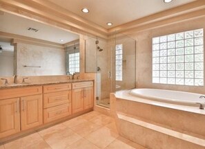 Bathtub, hair dryer, towels, soap