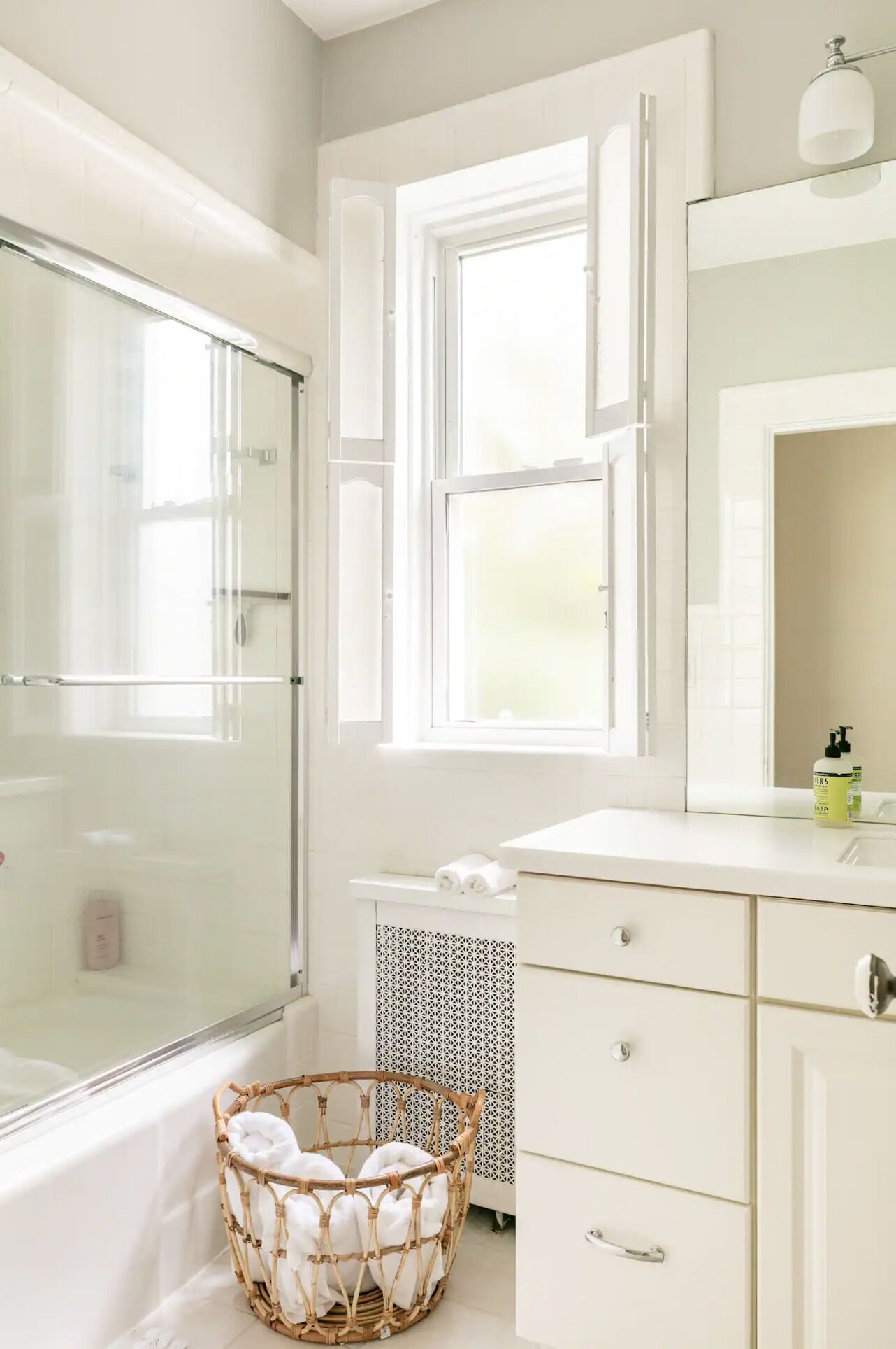 Combined shower/tub, hair dryer, towels, soap