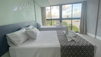 Apartamento Luxo com Varanda Vista Mar | 1 quarto, roupas de cama premium, frigobar, escrivaninha