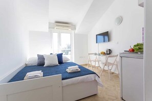 1 chambre, fer et planche à repasser, accès au Wi-Fi (inclus)