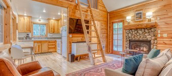 Dog-friendly cabin with deck, fenced yard, game room, & hot tub
