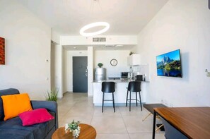 Appartement | Privékeuken | Een koelkast/vriezer, een magnetron, een oven, een kookplaat