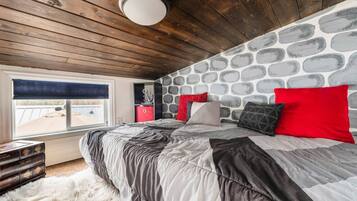 1 bedroom, desk, iron/ironing board, travel crib