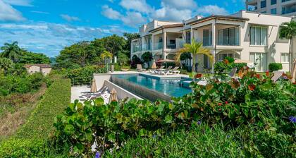 Stylish, ocean-view condo on ground floor with pool, washer/dryer, & patio