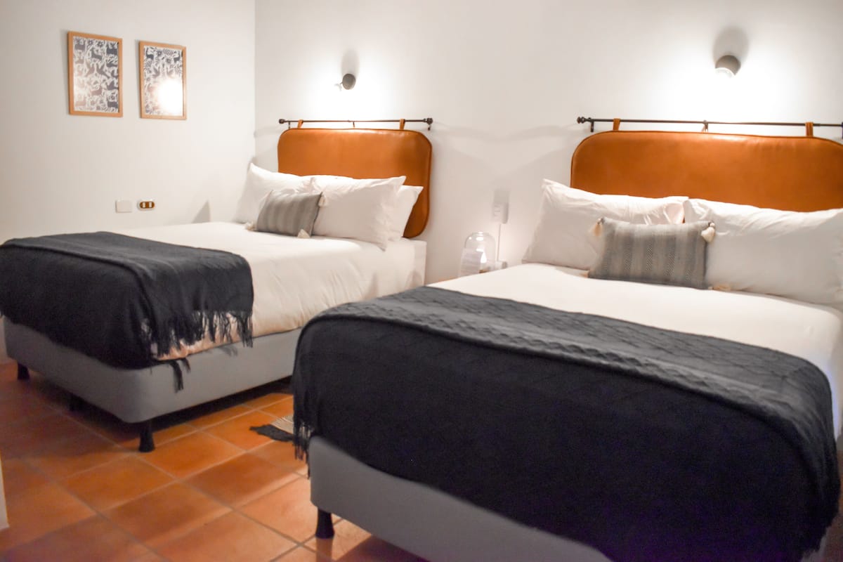 Deluxe Room, 2 Double Beds - Second Floor | ผ้าม่านกันแสง, เตารีด/โต๊ะรีดผ้า, Wi-Fi ฟรี