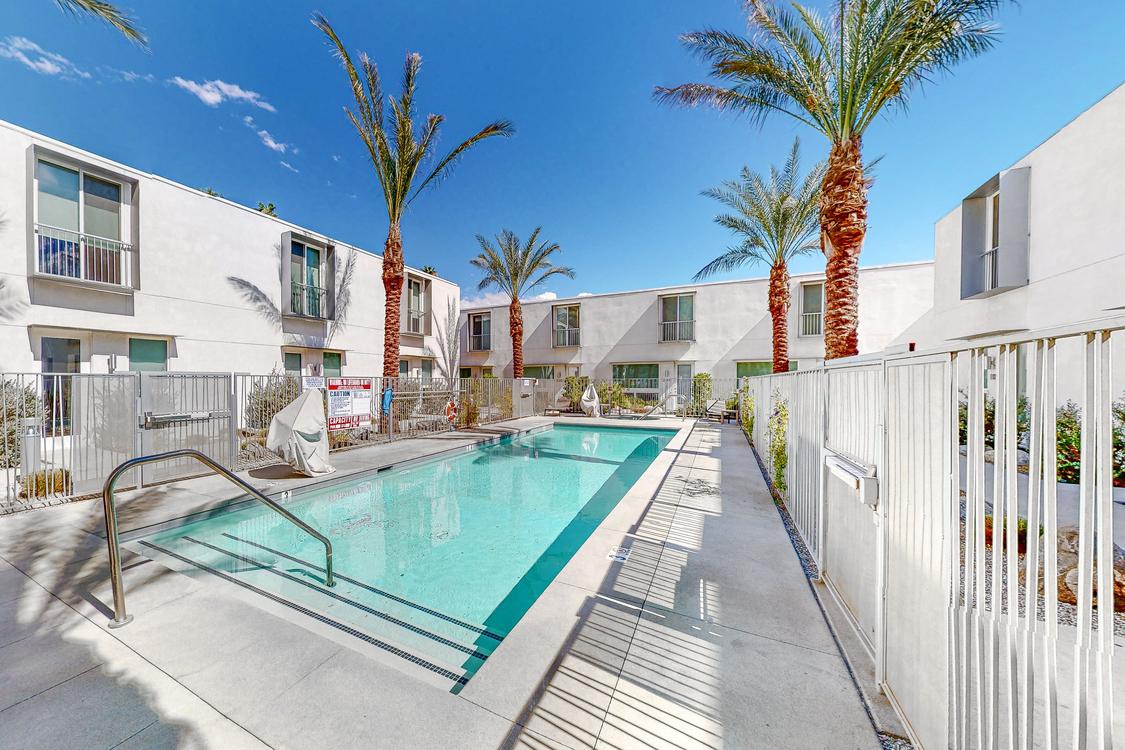 Mountain-view townhome with pool, hot tub, outdoor living, office, & W/D