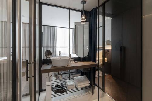 Suite, Non Smoking | Bathroom | Hair dryer, bathrobes, slippers, towels
