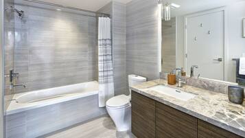 Hair dryer, towels, soap, toilet paper