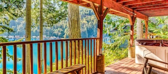 Lakefront home with stunning views, private hot tub, dock & 2-story deck