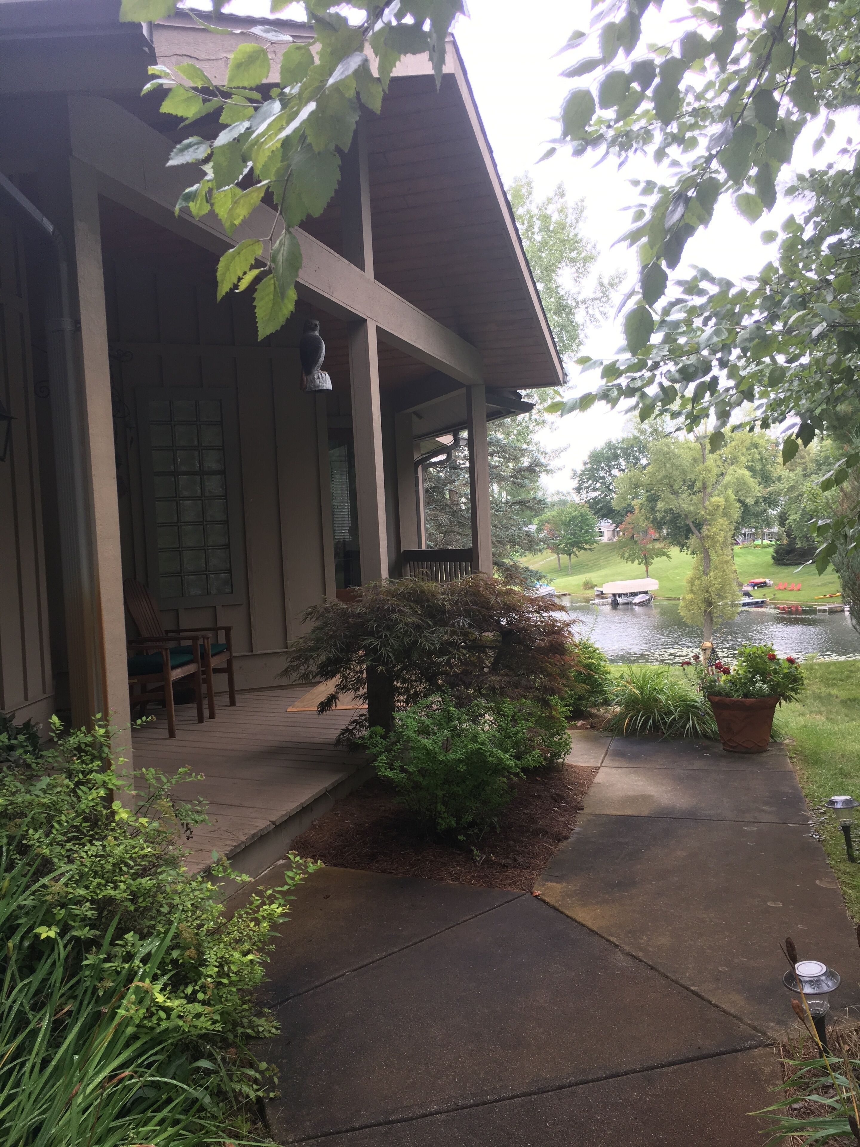 Lakefront Island Home. Golf and Family retreat with lake views and beach access.