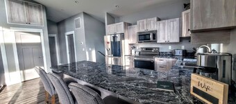 BEAUTIFUL NEW home with THE BEST VIEWS OF THE MISSOURI RIVER