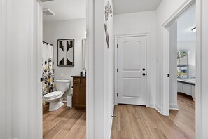 Combined shower/tub, hair dryer, towels, soap