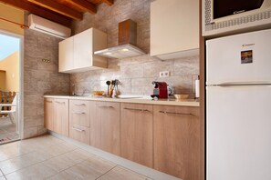 Fridge, microwave, stovetop, coffee/tea maker - Vacation Home "Casa Paco 1" with Private Terrace, Shared Pool & Wi-Fi (Costa Calma)