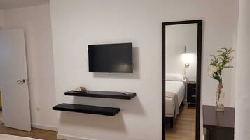 3 habitaciones, tabla de planchar con plancha y wifi gratis