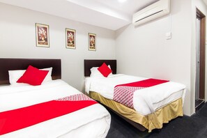 Habitación Deluxe con 2 camas individuales | Wifi gratis y ropa de cama