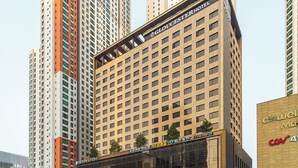 A tall hotel building with a prominent sign reading "GLOUCESTER HOTEL". - GLOUCESTER HOTEL CHEONGJU (Cheongju)
