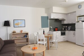 Classic Apartment | Living area | Flat-screen TV
