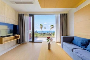 Deluxe Twin Room, Ocean View | Living area | 40-inch LED TV with cable channels, TV, heated floors - Stanford Hotel & Resort Jeju (Jeju City)