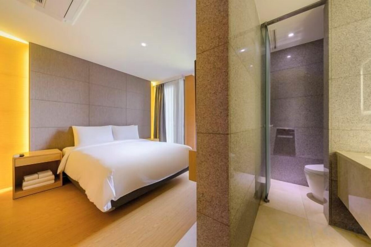 Luxe beddengoed, donzen dekbedden, een gratis minibar