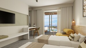 Une chambre d’hôtel moderne dotée d’une télévision à écran plat, d’un bureau avec une chaise, d’un canapé, d’une petite table et offrant une vue sur la mer grâce à de grandes fenêtres.