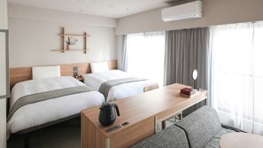 Laptop workspace, blackout curtains, free WiFi, bed sheets