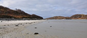 Lochside with beach access uninterrupted views of spectacular Highland Mountains
