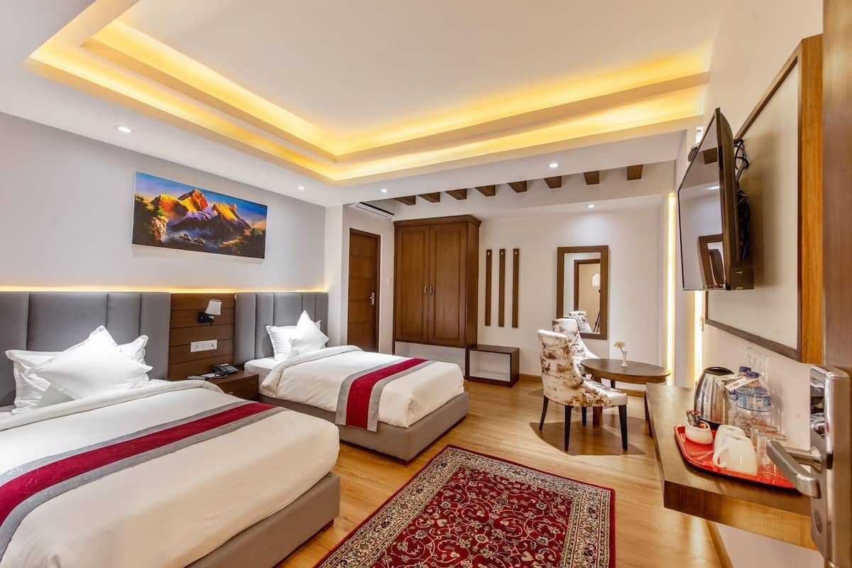 Premium bedding, laptop workspace, iron/ironing board, WiFi (free)